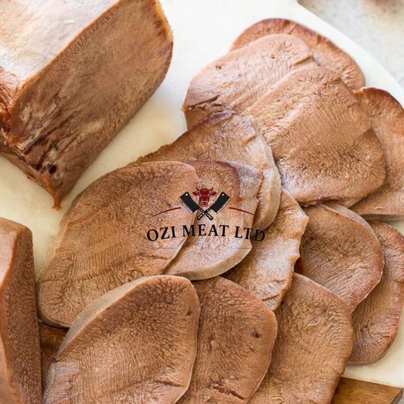 Sliced beef tongue on a board