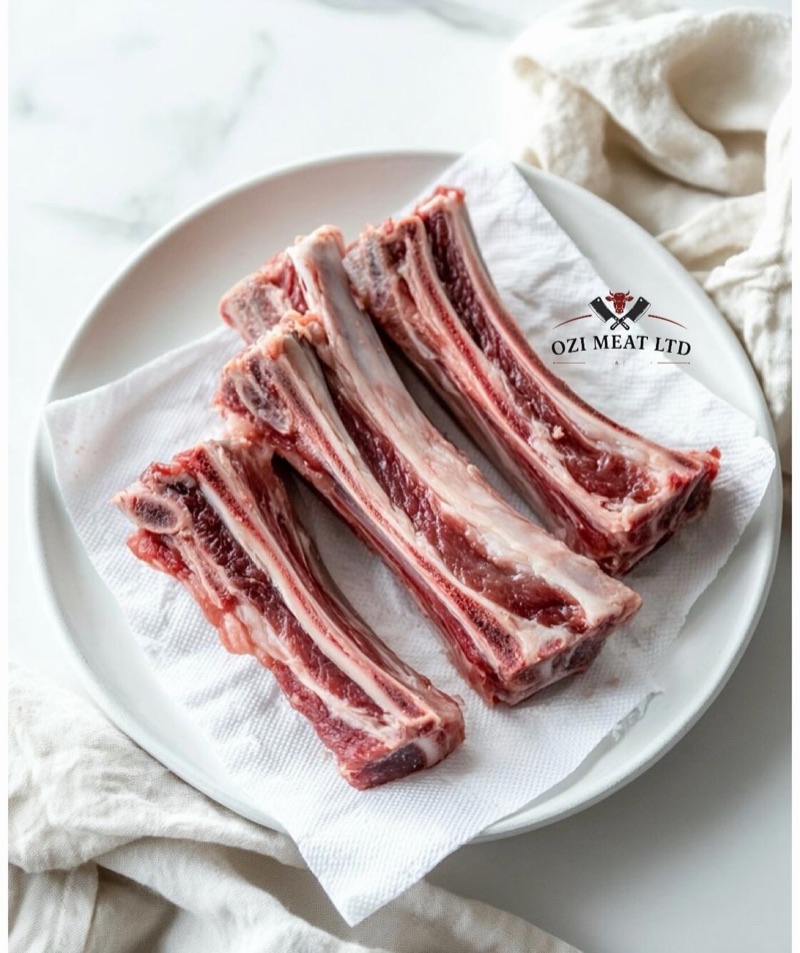 Lamb ribs on a white plate